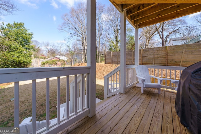 wooden deck featuring fence and grilling area