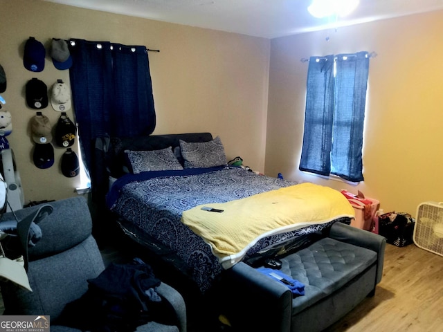 bedroom with light wood-style floors