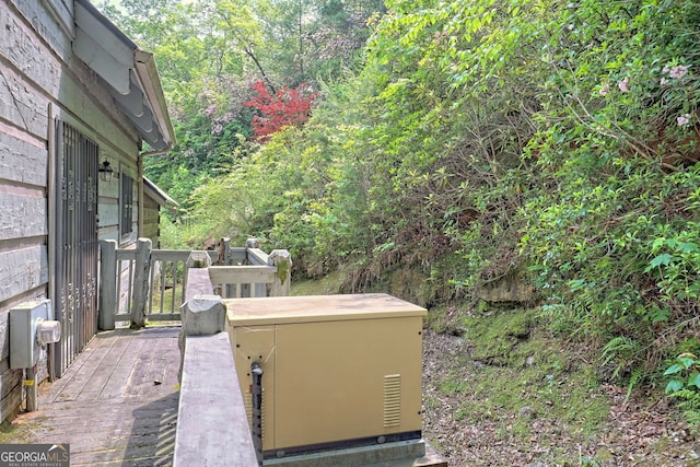 view of patio / terrace featuring a view of trees