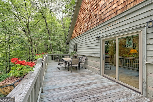 deck featuring outdoor dining space