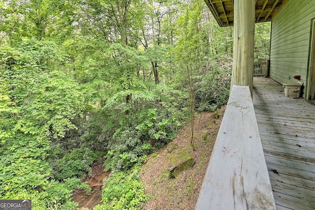 view of yard with a view of trees