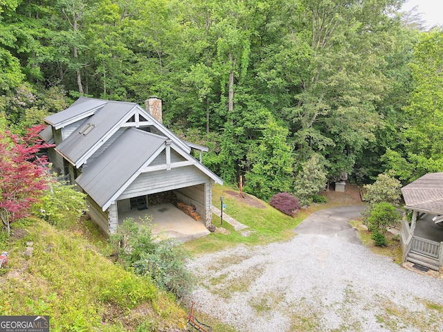 bird's eye view featuring a forest view