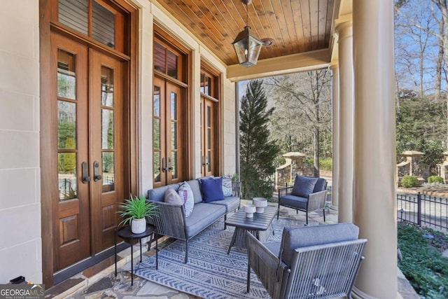 exterior space with an outdoor hangout area and french doors