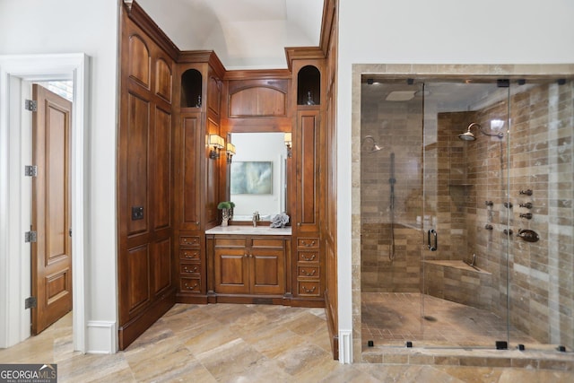 full bath featuring a stall shower and vanity