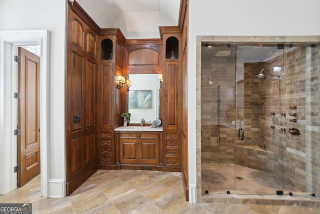440 Belada Blvd, Sandy Springs, GA 30342 - bathroom featuring vanity, a shower stall, and vaulted ceiling
