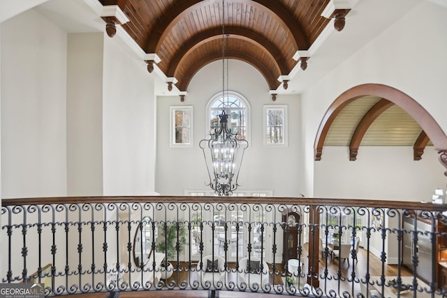 440 Belada Blvd, Sandy Springs, GA 30342 - detailed view of a chandelier and a wood ceiling with exposed beams