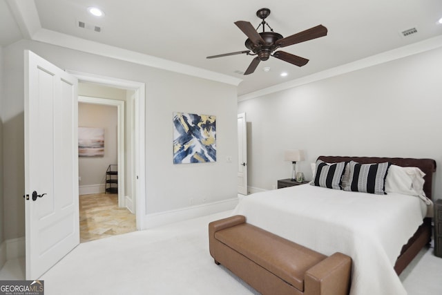 bedroom with recessed lighting, visible vents, crown molding, and baseboards