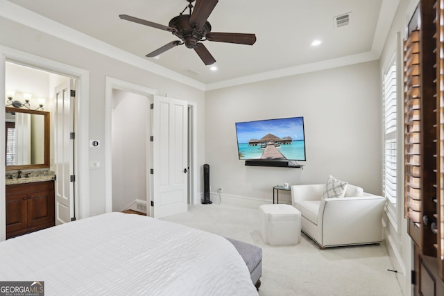 bedroom with recessed lighting, visible vents, crown molding, and light carpet