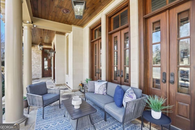 440 Belada Blvd, Sandy Springs, GA 30342 - covered porch featuring french doors and an outdoor hangout area