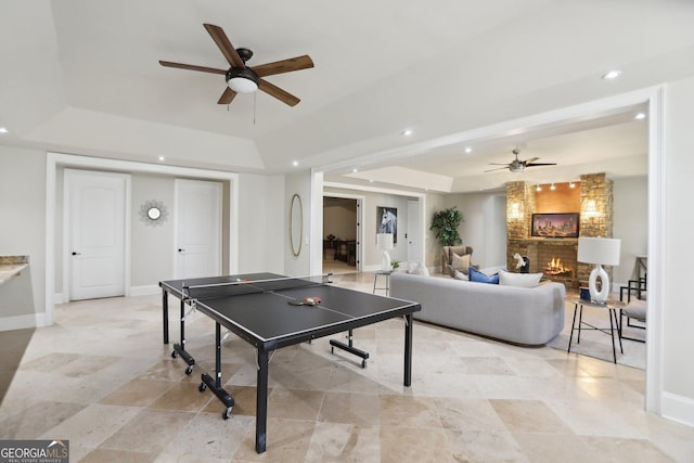 440 Belada Blvd, Sandy Springs, GA 30342 - recreation room with a raised ceiling, ceiling fan, a fireplace, and recessed lighting