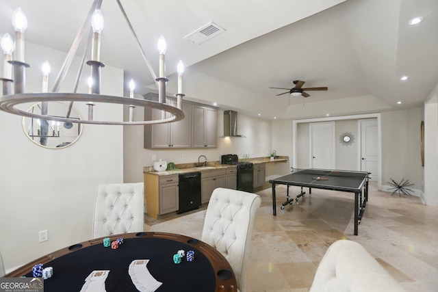440 Belada Blvd, Sandy Springs, GA 30342 - kitchen featuring black appliances, wall chimney exhaust hood, gray cabinets, a ceiling fan, and a tray ceiling