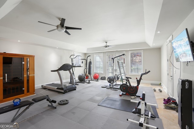 exercise area featuring a ceiling fan, recessed lighting, and baseboards