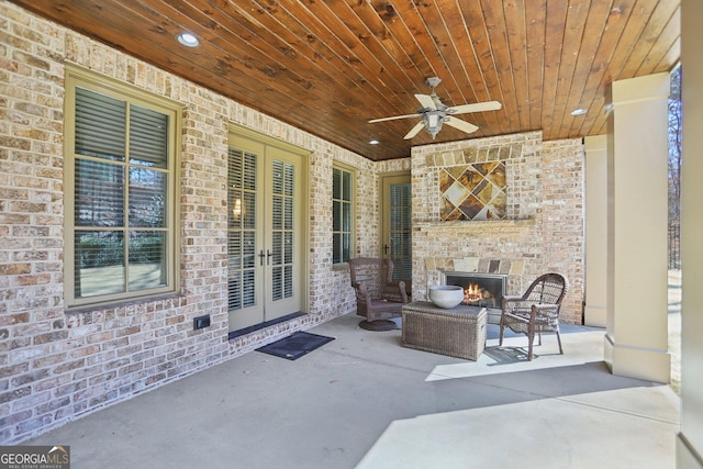 440 Belada Blvd, Sandy Springs, GA 30342 - view of patio / terrace with an outdoor brick fireplace, french doors, and a ceiling fan