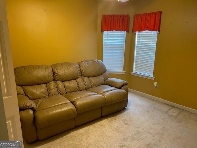 355 Tait Rd, Stockbridge, GA 30281 - carpeted living room with baseboards