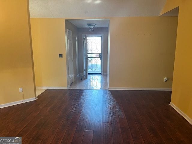 355 Tait Rd, Stockbridge, GA 30281 - spare room with hardwood / wood-style floors and baseboards