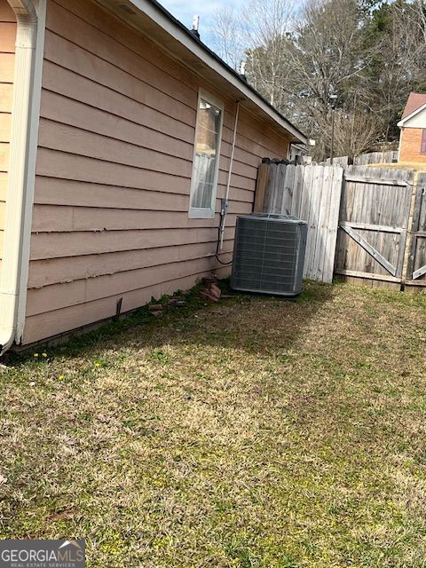 355 Tait Rd, Stockbridge, GA 30281 - view of yard with central AC unit