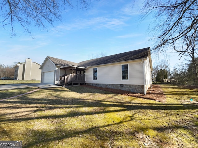 view of front of house with driveway, crawl space, an attached garage, a porch, and a front yard