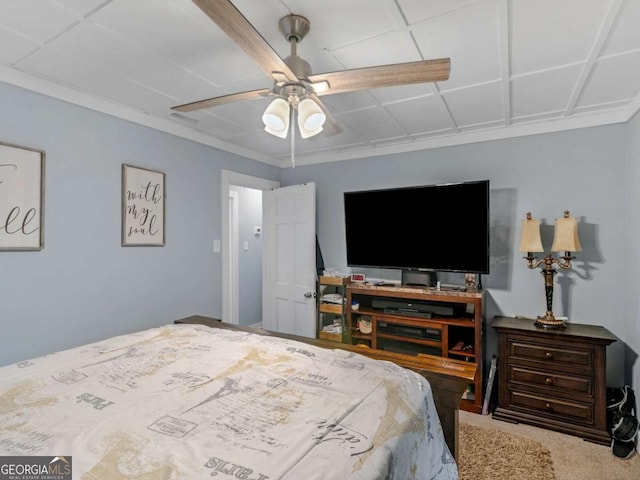 carpeted bedroom featuring a ceiling fan