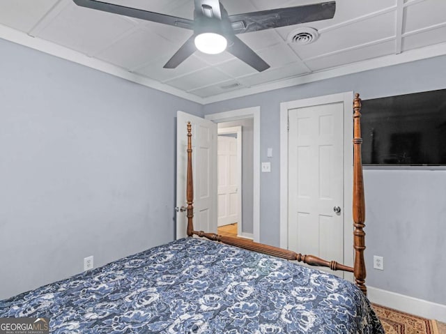 unfurnished bedroom featuring visible vents, ceiling fan, and baseboards