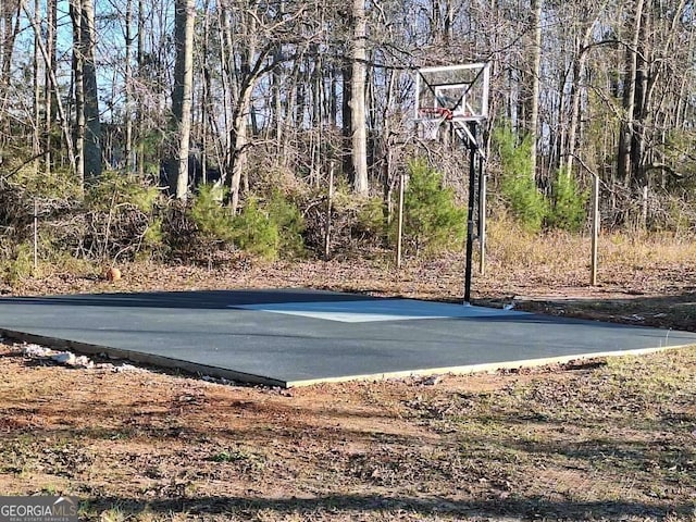 view of sport court featuring basketball court