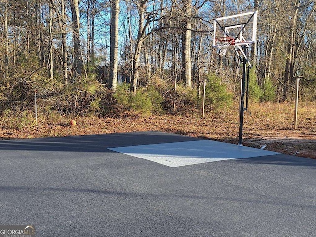 view of sport court featuring community basketball court