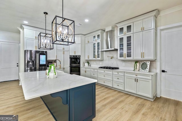 2634 Greenes Ln, Powder Springs, GA 30127 - kitchen featuring a notable chandelier, black appliances, wall chimney exhaust hood, and white cabinetry