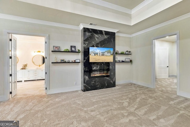 2634 Greenes Ln, Powder Springs, GA 30127 - living room featuring visible vents, crown molding, baseboards, carpet, and a fireplace