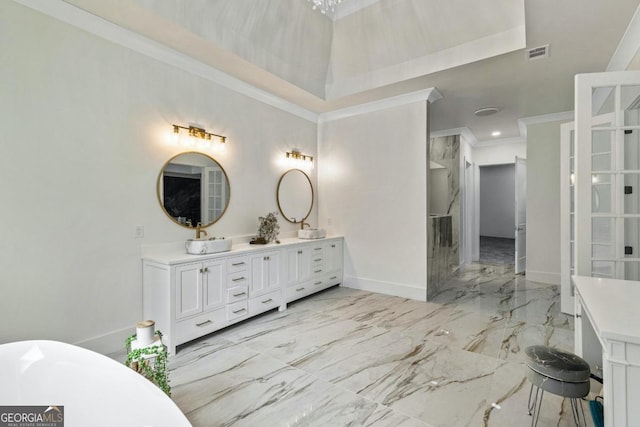 2634 Greenes Ln, Powder Springs, GA 30127 - bathroom with visible vents, a freestanding bath, double vanity, ornamental molding, and marble finish floor
