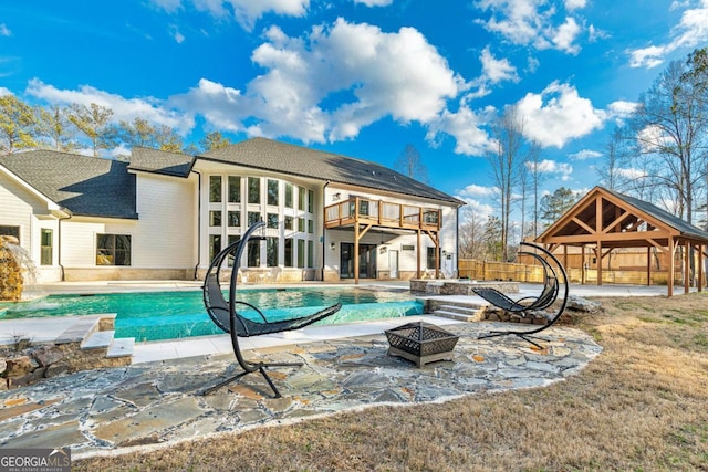 2634 Greenes Ln, Powder Springs, GA 30127 - view of pool with a gazebo, a fire pit, a fenced in pool, and a patio area