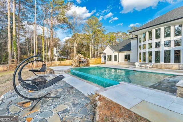 2634 Greenes Ln, Powder Springs, GA 30127 - view of swimming pool with a fenced in pool, fence, and a patio area