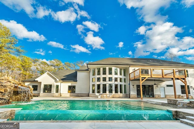 2634 Greenes Ln, Powder Springs, GA 30127 - back of house with a patio area and an outdoor pool