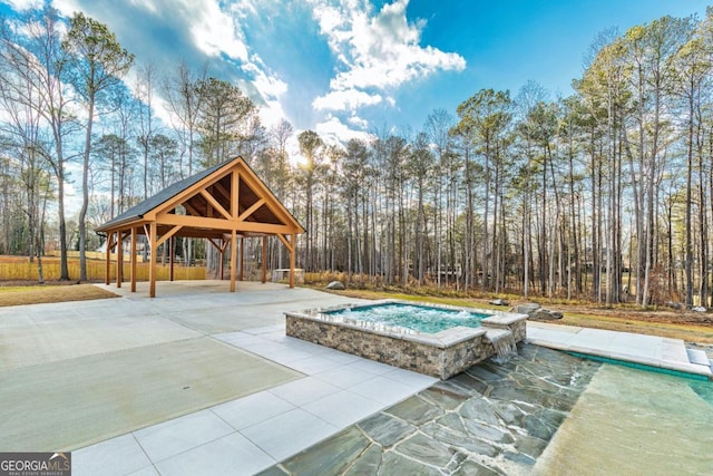 2634 Greenes Ln, Powder Springs, GA 30127 - view of pool with a gazebo, an in ground hot tub, and a patio area