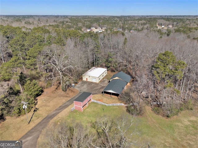 bird's eye view with a forest view