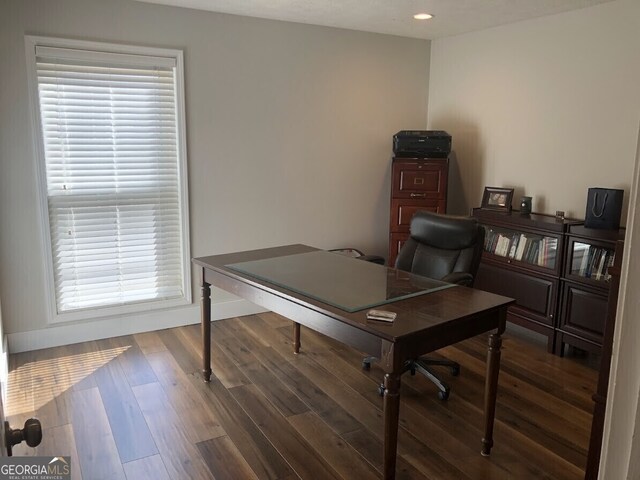 home office with baseboards, recessed lighting, wood finished floors, and a healthy amount of sunlight