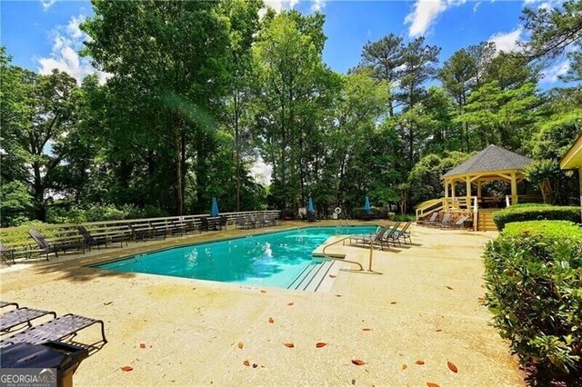 pool with playground community and fence