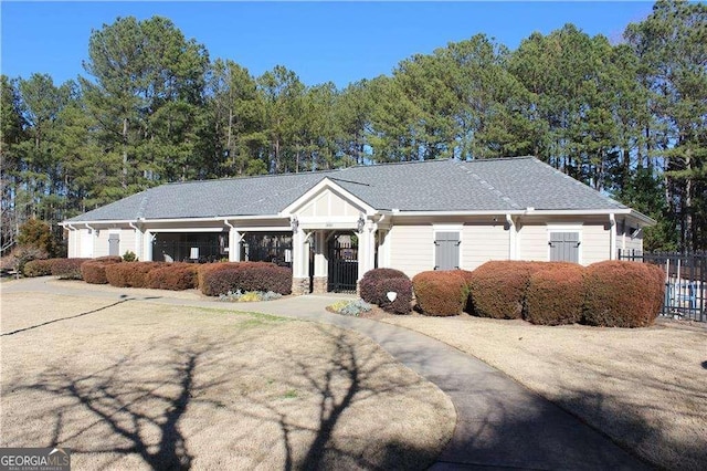 view of front of home with fence