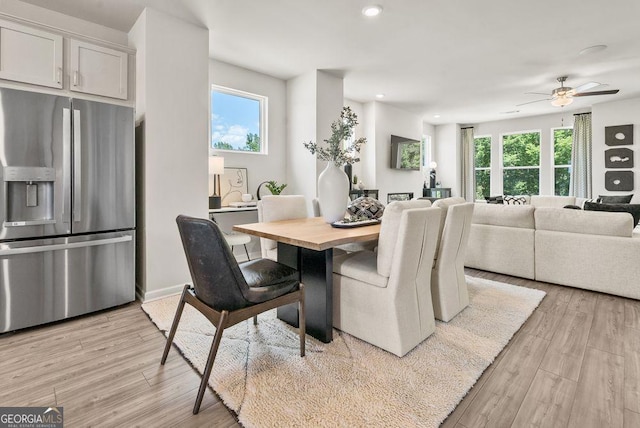 dining space with light wood-style floors, recessed lighting, and ceiling fan