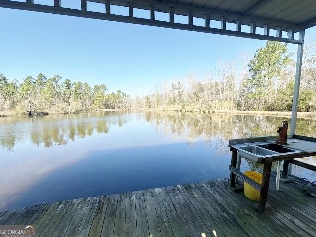 view of dock with a water view