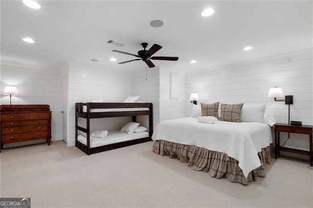 bedroom featuring light carpet, ceiling fan, crown molding, and recessed lighting