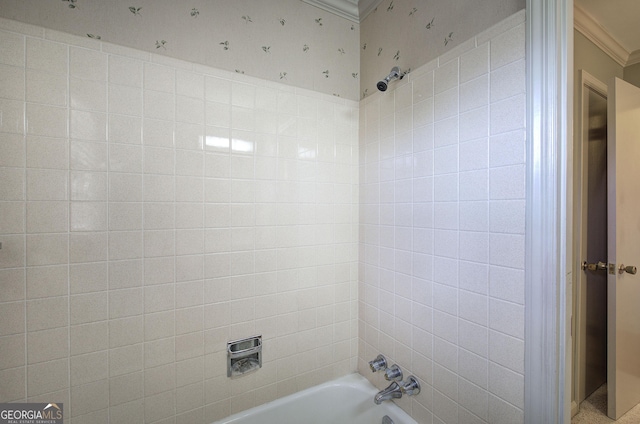 bathroom with ornamental molding and bathtub / shower combination