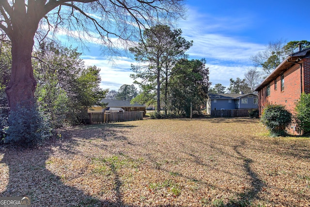 view of yard with fence