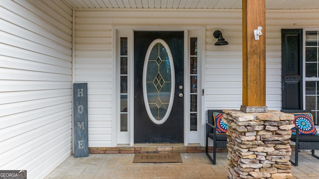 property entrance with a porch