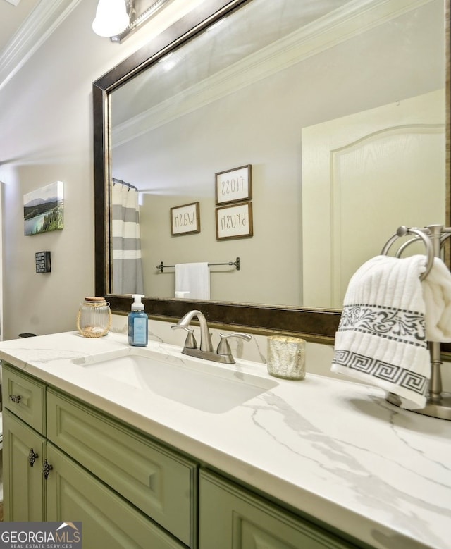 full bath with crown molding and vanity