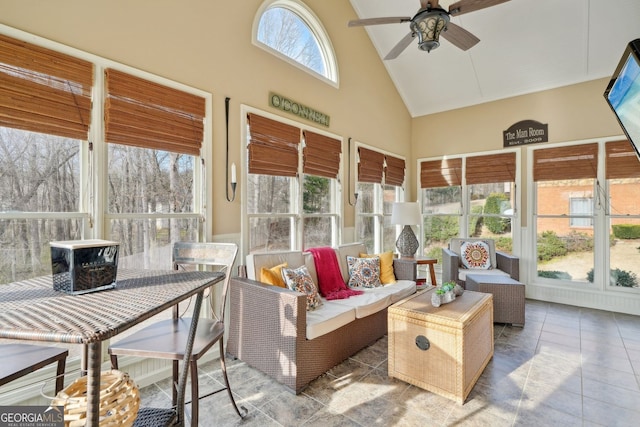 sunroom / solarium with vaulted ceiling and ceiling fan