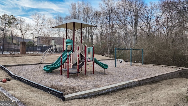 community jungle gym with fence