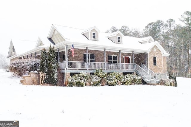 cape cod home with a porch