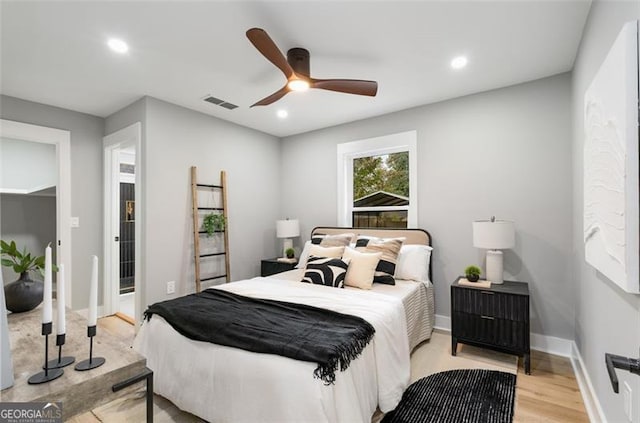 bedroom with recessed lighting, visible vents, a ceiling fan, light wood-type flooring, and baseboards