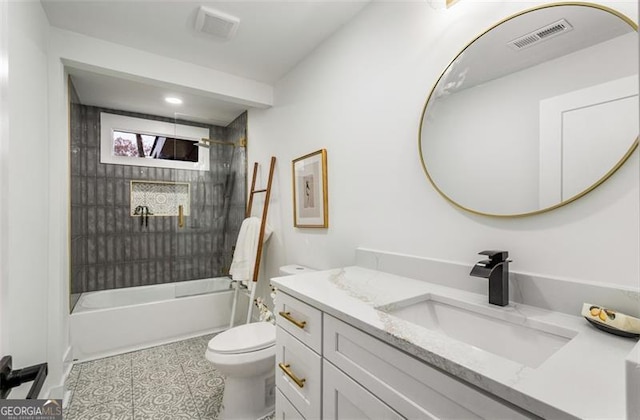 full bath featuring toilet, washtub / shower combination, visible vents, and vanity