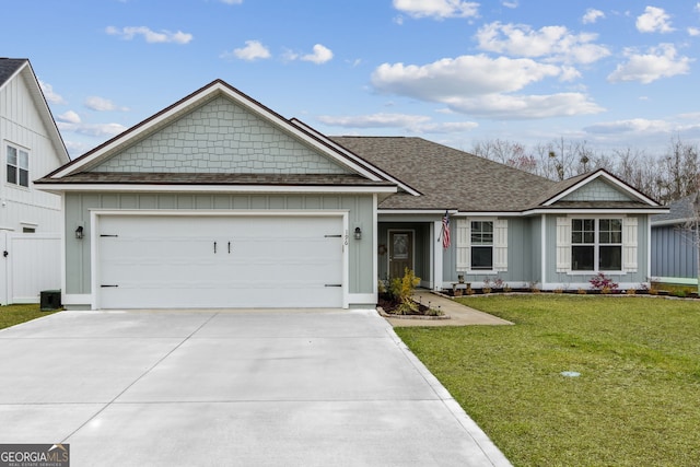 ranch-style house featuring an attached garage, concrete driveway, board and batten siding, and a front yard