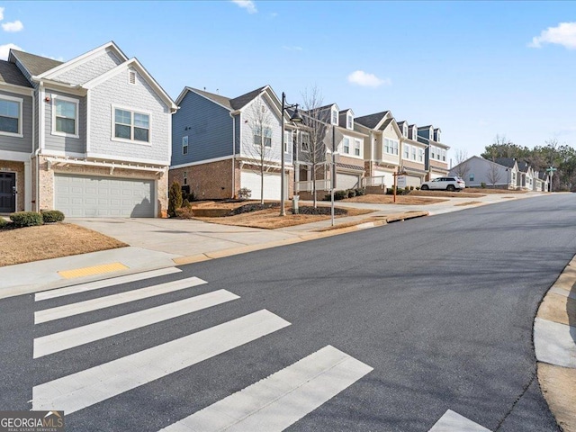 view of road featuring a residential view and sidewalks